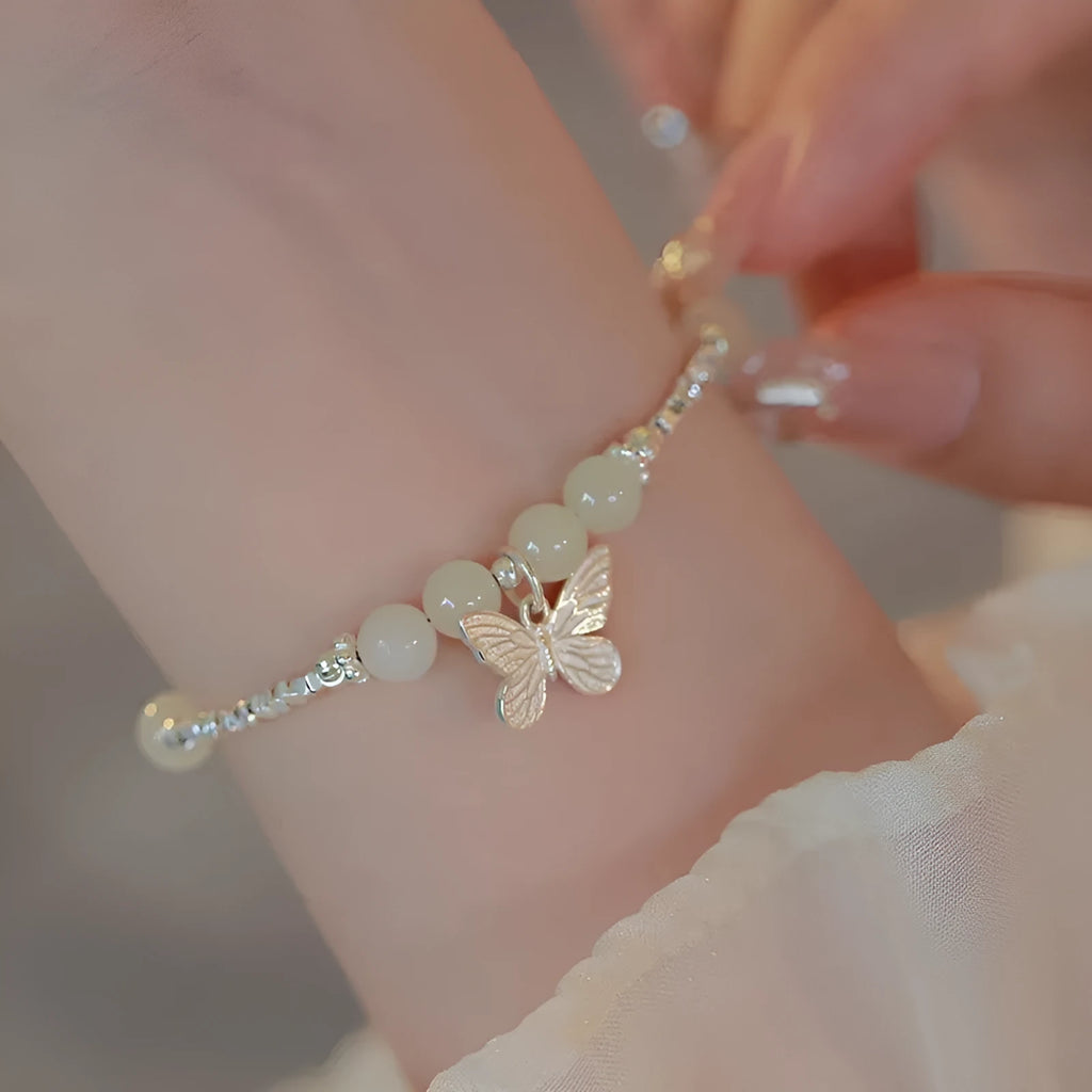 Hetian jade silver butterfly bracelet and necklace set with electroplated copper construction