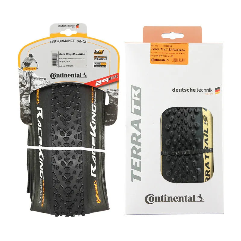 Mountain bike folding tyre shown in yellow and white for 26, 27.5, and 29-inch wheels.