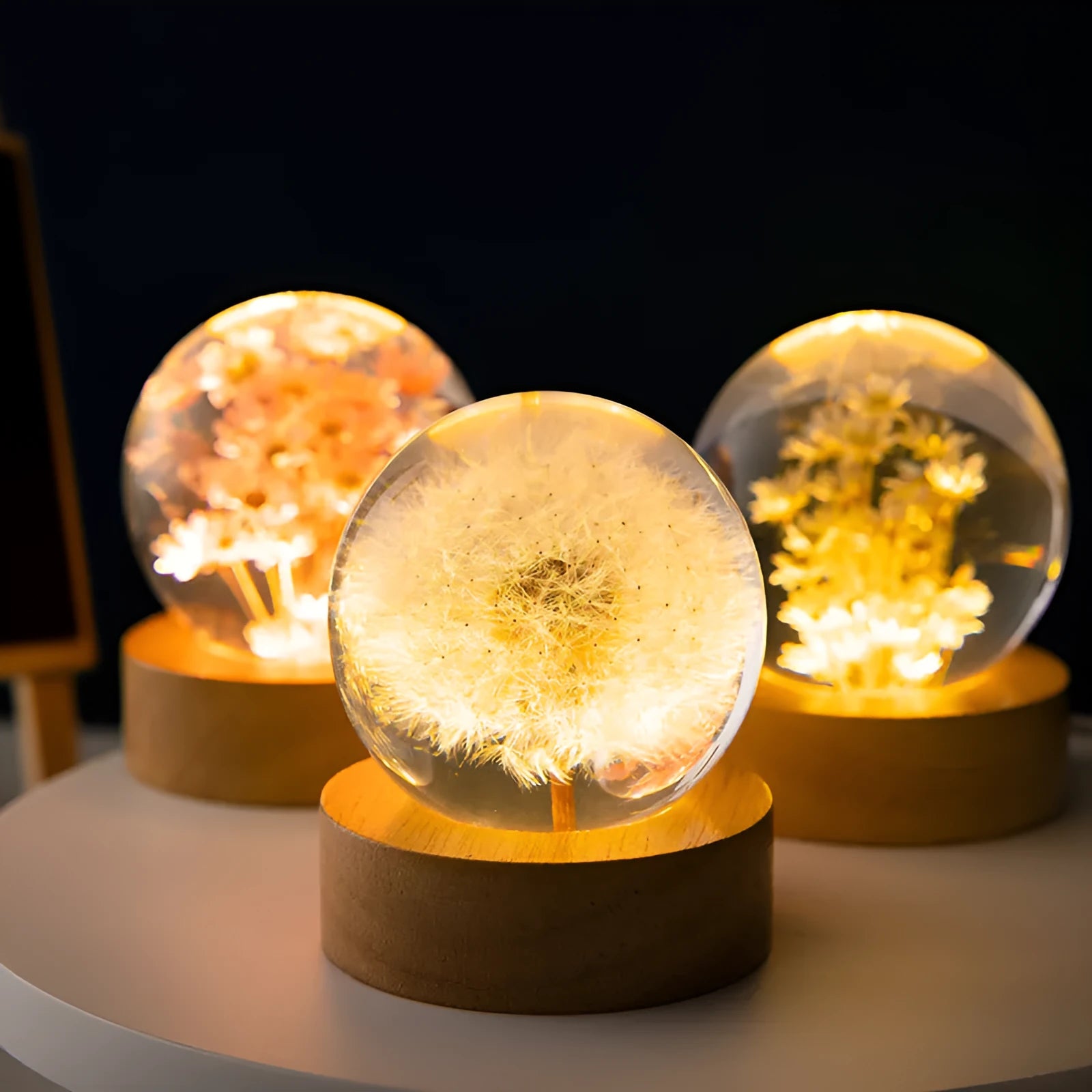 USB dandelion crystal ball night light on wooden base, showing preserved flowers inside 6cm resin sphere.