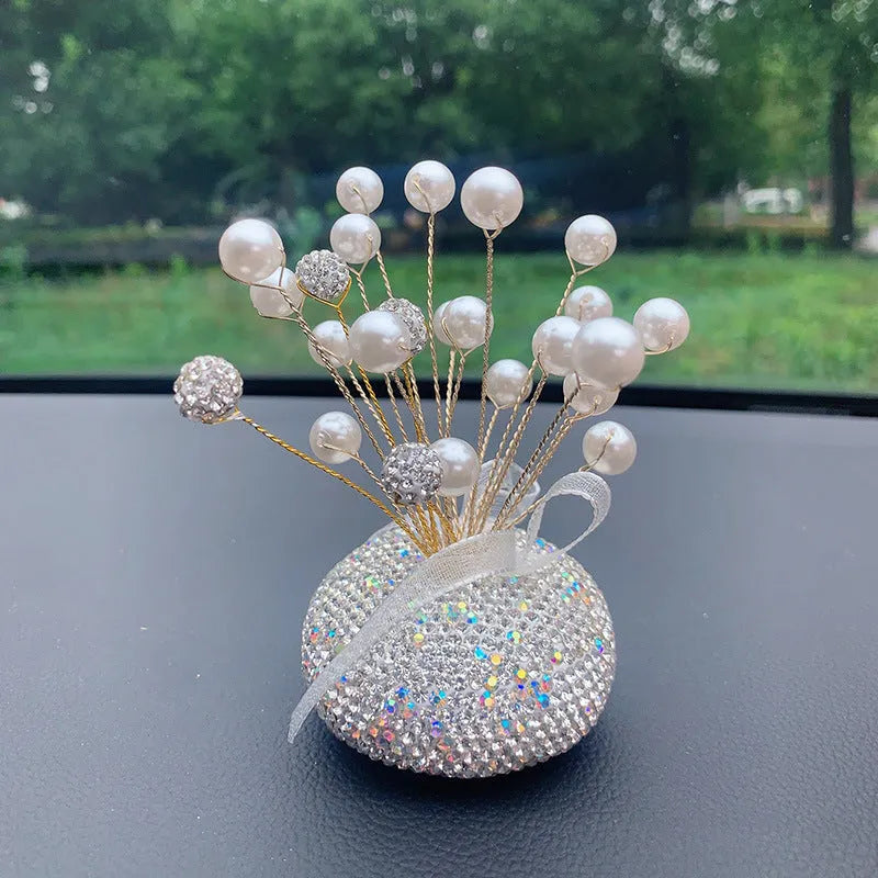 Clay star car decoration ornament for centre console in various red, pink, and pearl white colour designs.