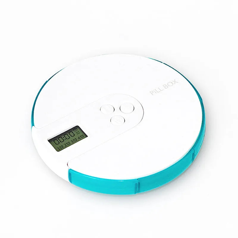 Blue seven-day alarm clock pill dispenser with digital display, showing daily compartments and measuring 11cm wide.