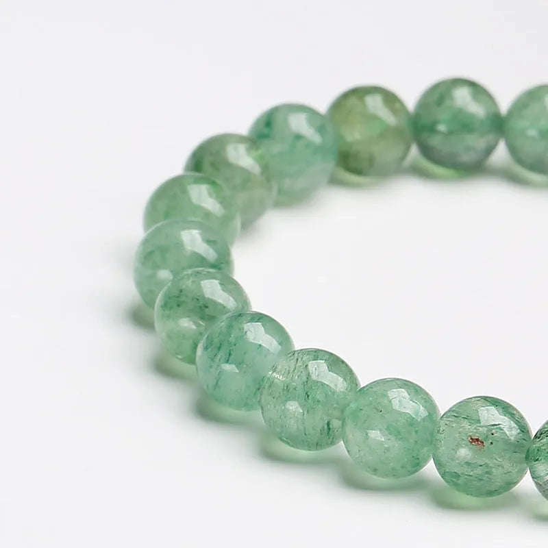 Green strawberry quartz single circle ball bracelet with 7.5mm beads and hand-woven construction