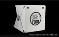 Portable folding LED studio mini light box with 22.6x23x24cm dimensions and 20cm light bar