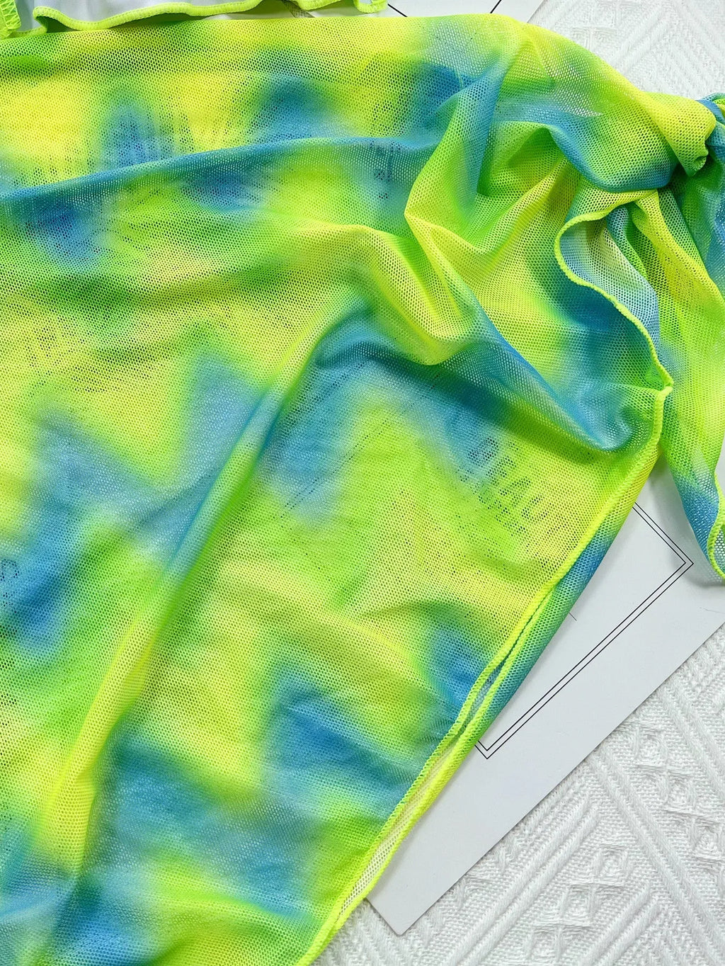 Green tie-dyed women's bikini swimsuit with removable outer skirt for swimming