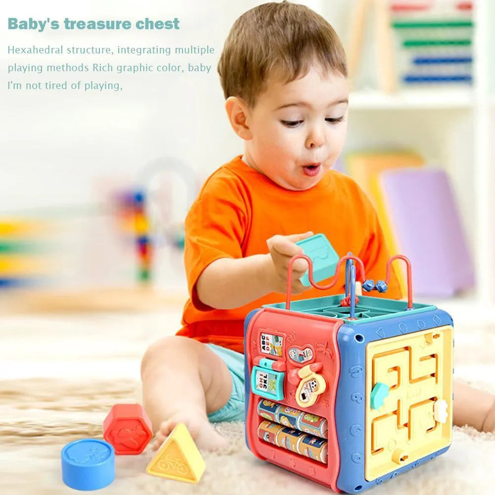 Baby educational hexahedron cube with six learning activities showing bead maze, gears, and shape sorting