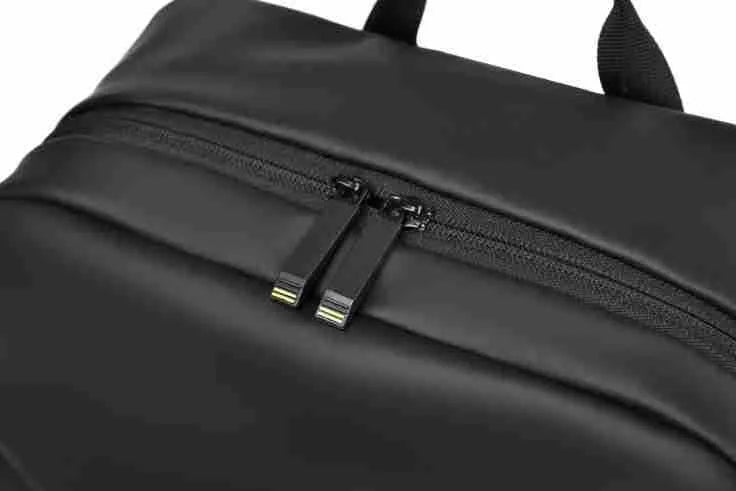 Men's waterproof PU leather backpack in black colour with computer compartment