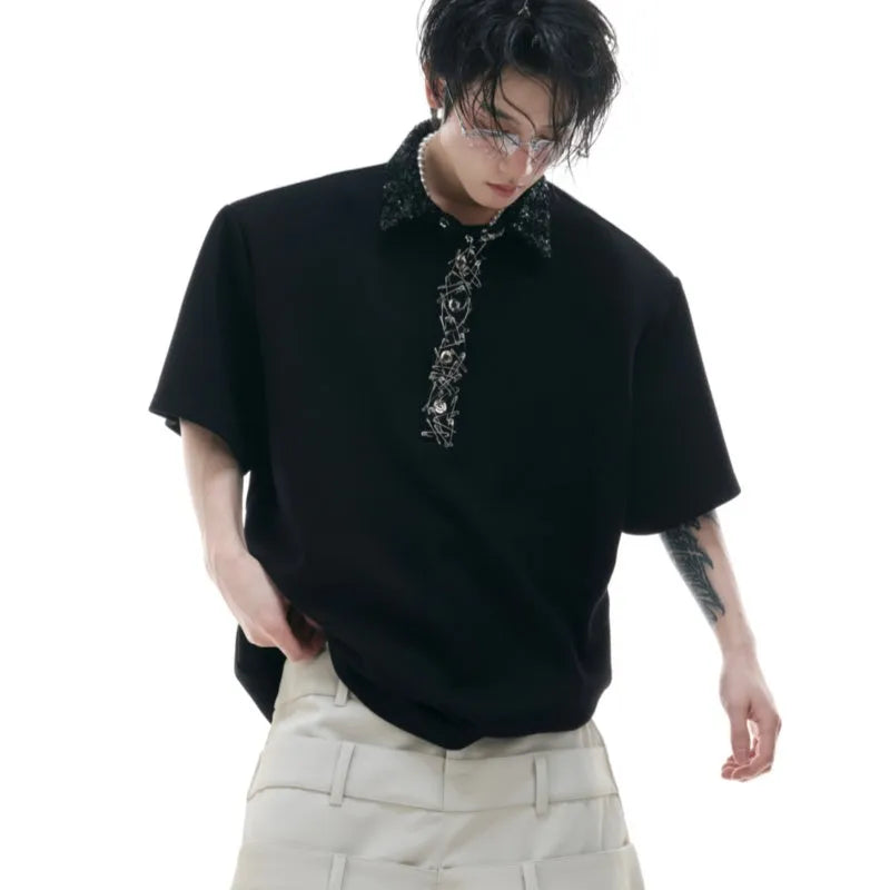 Men's black loose polo t-shirt with a square collar detailed with embroidery and sequins