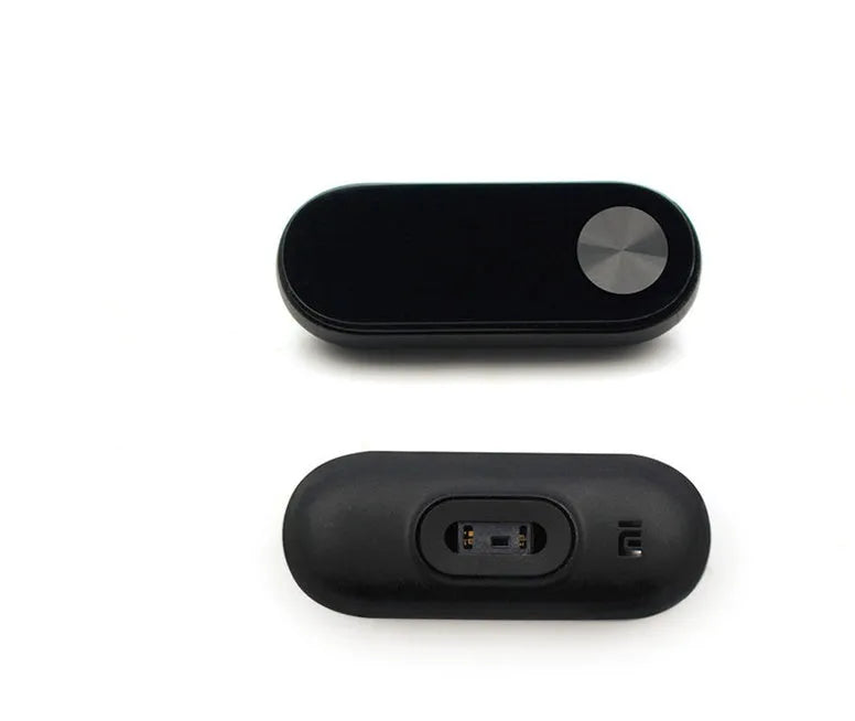 Black Xiaomi Mi Band 2 smart band with OLED display on a wrist, showing heart rate.