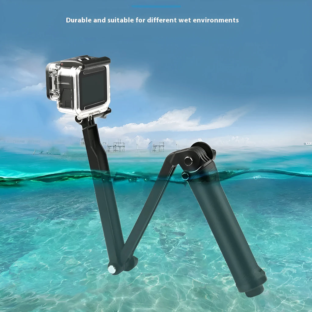 Black folding tripod stand for GoPro Hero action cameras on a flat surface