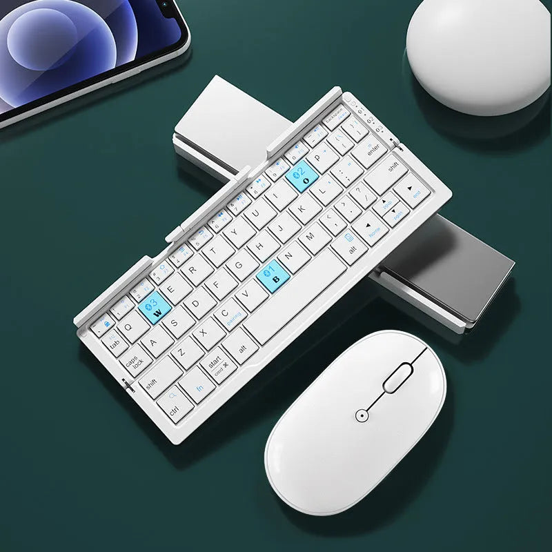 Silver white aluminium folding Bluetooth keyboard open with smartphone on integrated stand
