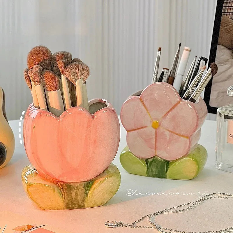Ceramic pen holder box with floral pattern for desk organisation.