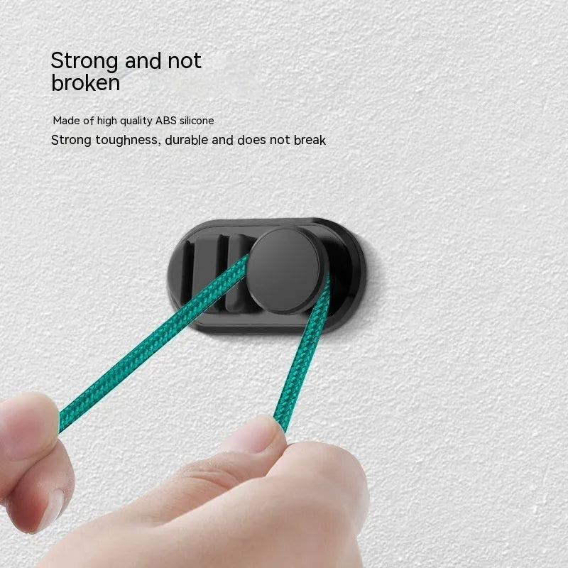 Dark green car data cable storage hook made of ABS silicone showing compact dimensions
