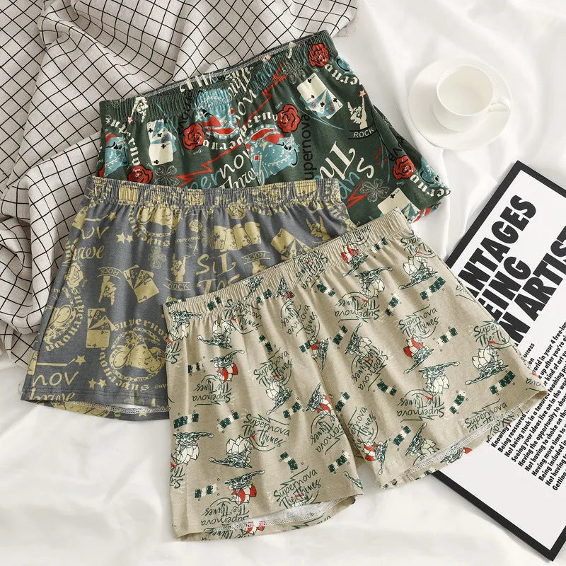Men's grey printed cotton boxer shorts with a loose, casual fit and mid-waist design.