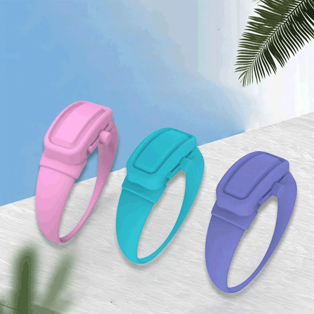 Portable hand sanitizer dispenser silicone wristband with refill cap, black band holding 6mL bottle