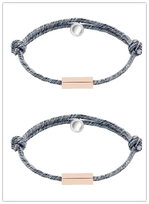Pair of stainless steel magnetic bracelets for couples, silver and rose gold finish, with adjustable hand rope