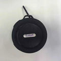 Compact waterproof Bluetooth speaker with a mounting clip, shown in blue.