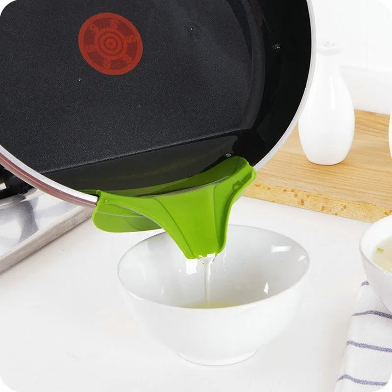 Green silicone kitchen funnel with clip for secure attachment to round pots