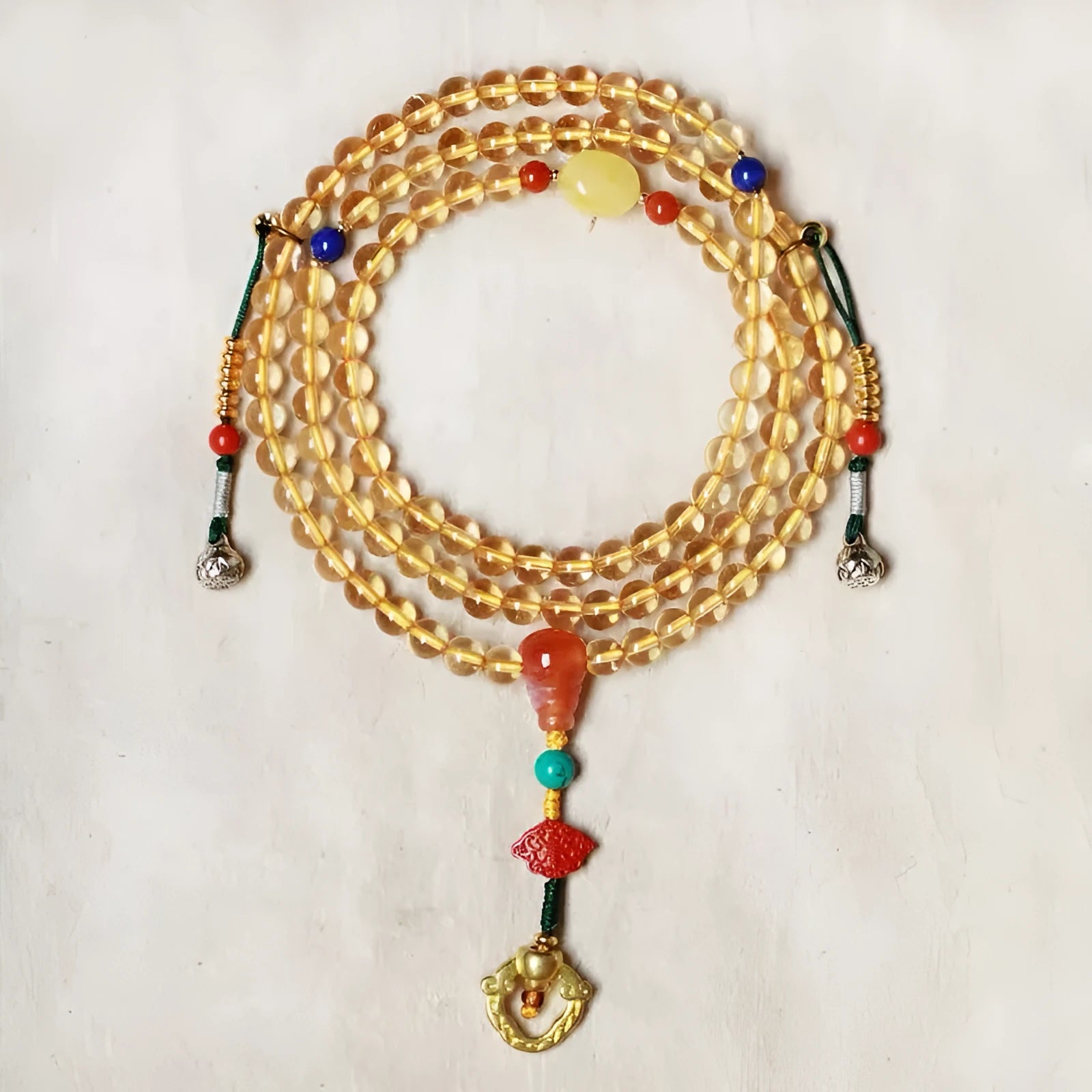Brazilian natural citrine bracelet with yellow and red body colour, 1mm bead diameter