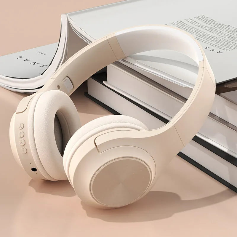 Wireless Bluetooth headset with head-mounted design in Youth Green colour, shown with its charging case.
