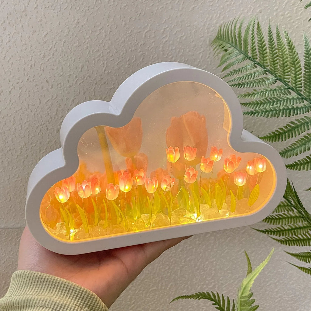 DIY cloud tulip night lamp kit with LED light, mirror, and photo frame on a desk