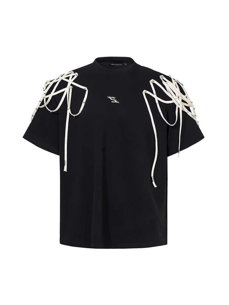Black loose fit women's T-shirt with padded shoulders and decorative rivet ribbon detail.