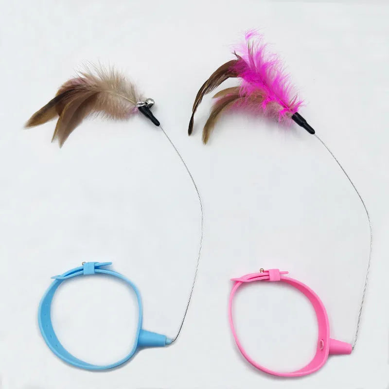 Adjustable cat collar toy with feather and bell attachments on steel wire teaser