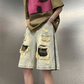 Men's straight-leg ripped camouflage denim shorts in yellow mud colours showing Korean style design