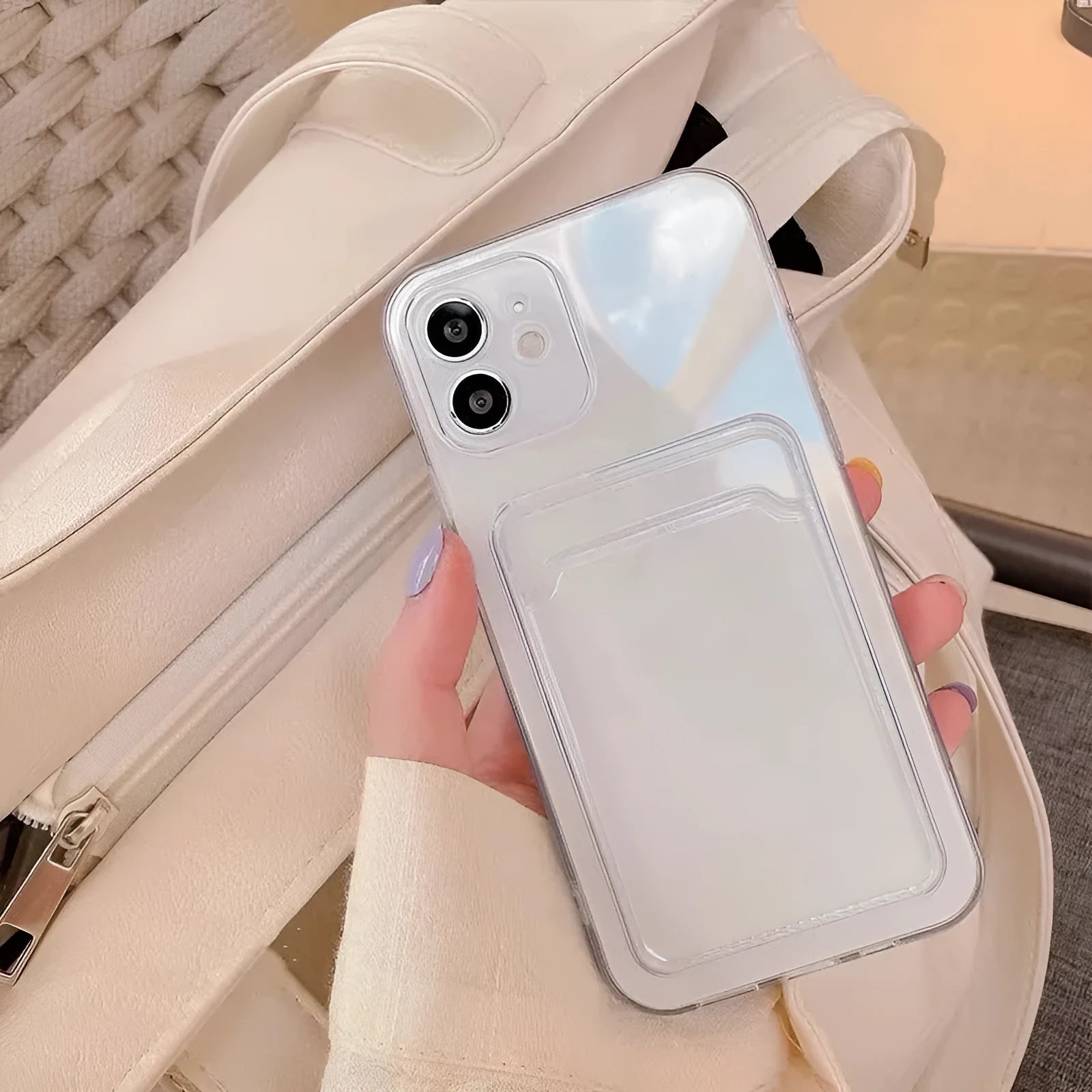 Transparent Apple iPhone wallet case showing card slots and clear PVC construction