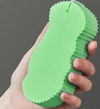 3D fish scale pattern bath sponge in white, grey, pink or light blue colours for gentle exfoliation