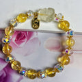 Women's crystal bracelet with a detailed nine-tail fox charm in natural citrine.