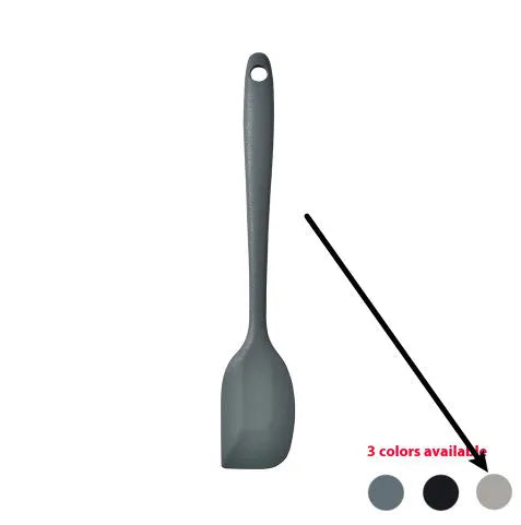 Black silicone kitchen utensil set with 12 tools in a rotating storage bucket on a kitchen countertop