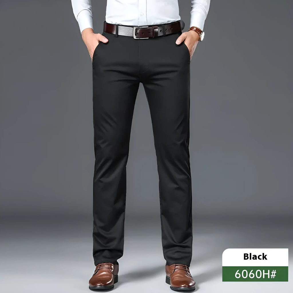 Men's straight-cut non-ironing casual trousers in black, shown flat.