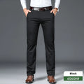 Men's straight-cut non-ironing casual trousers in black, shown flat.
