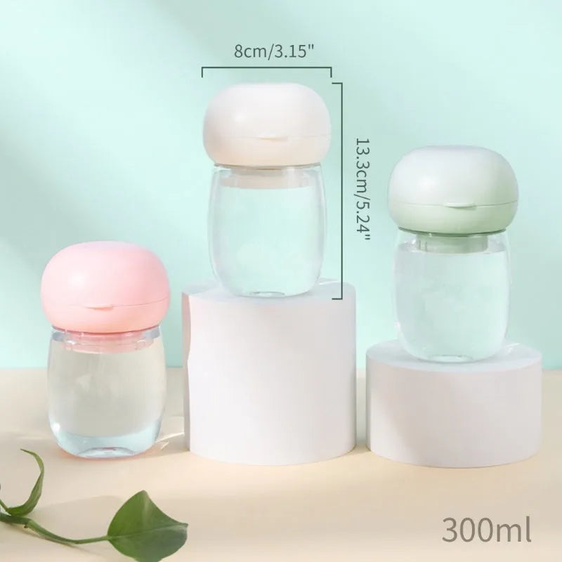 Portable dog water bottle with attached cup in white, 300ml capacity for walking and travel
