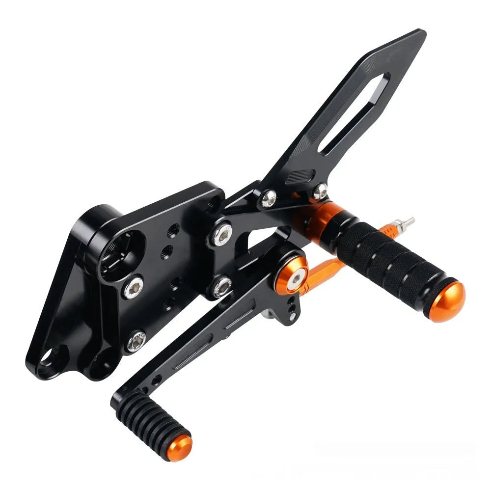 KTM Duke motorcycle black and orange foot pedal support assembly modification kit
