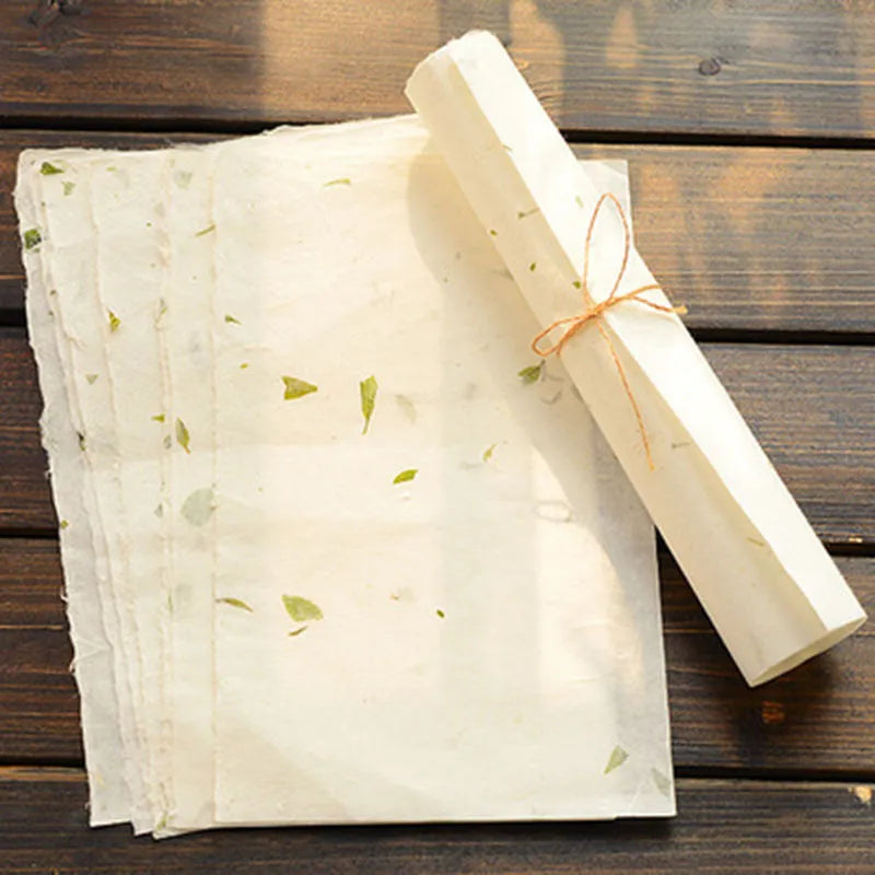 Ten sheets of Chinese-style painting paper in Green leaf design, each measuring 27.5 by 16.7 cm.