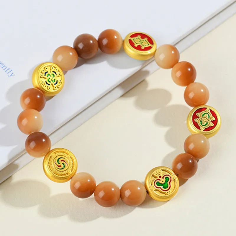 Yellow bodhi seed bracelet with geometric shapes measuring 14-17 inches