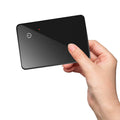Black pet tracking card with wireless charging and NFC functionality