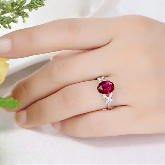 Women's copper butterfly and heart shape ring with 18k rose gold plating in red and blue colour options.