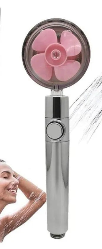 Blue handheld shower head with stop button and turbo nozzle on a chrome bracket.