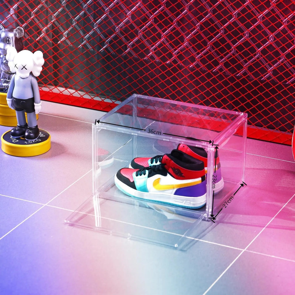 Large transparent acrylic shoe storage box with a magnetic side door open, showing interior space.