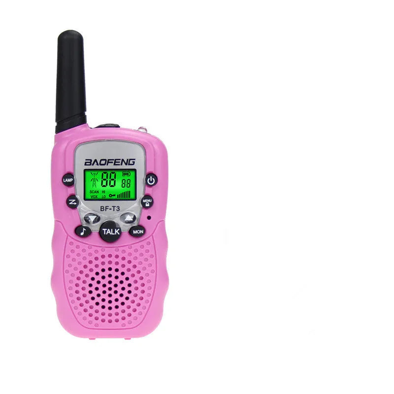 Child holding colourful walkie talkie with 22-channel display and push-to-talk button