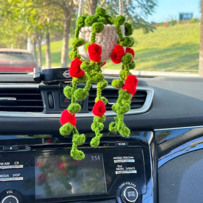 Green and white knitted wool car plant decoration with basin base and hanging rope