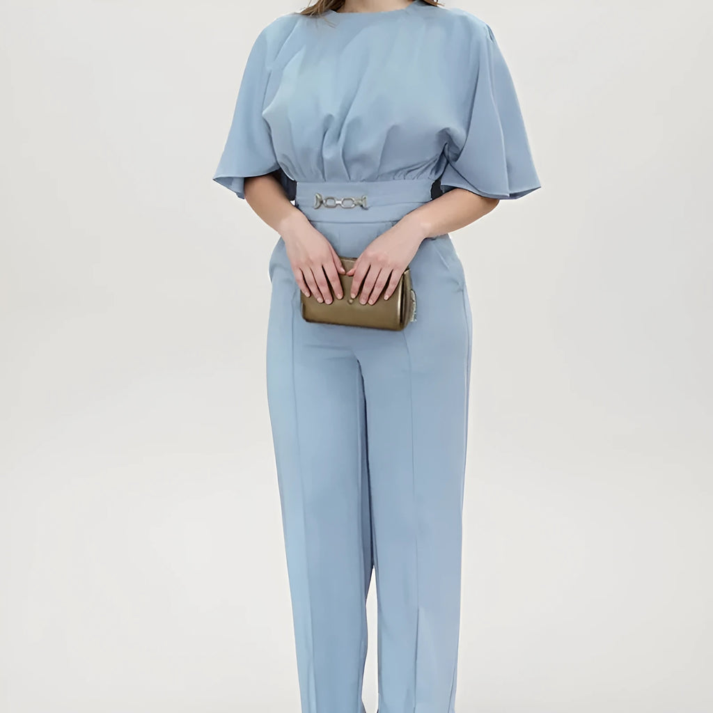 Blue men's polyester suit set with long-sleeved jacket and trousers on a hanger.