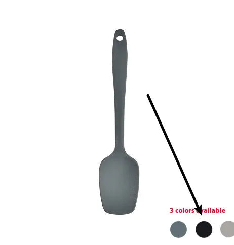 Black silicone kitchen utensil set with 12 tools in a rotating storage bucket on a kitchen countertop