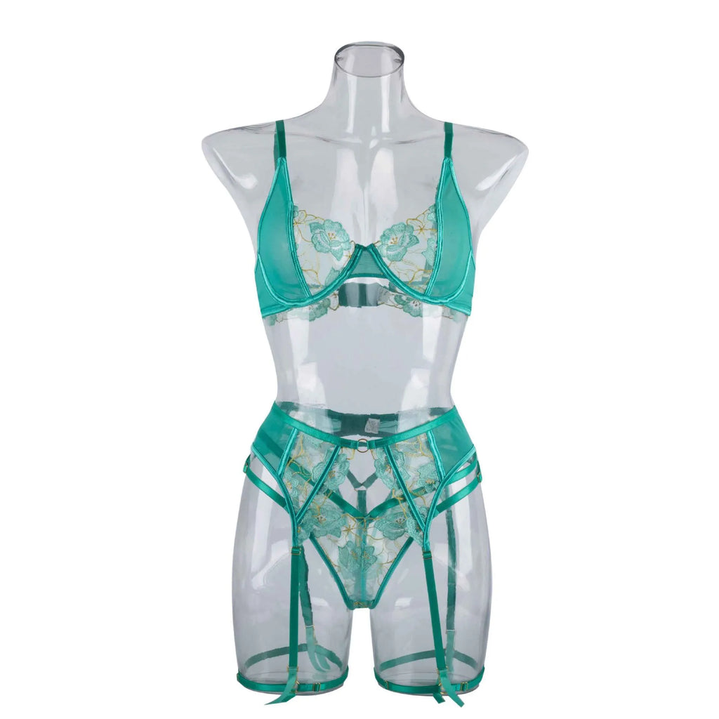 Light green women's embroidered bra and bikini set on a white background