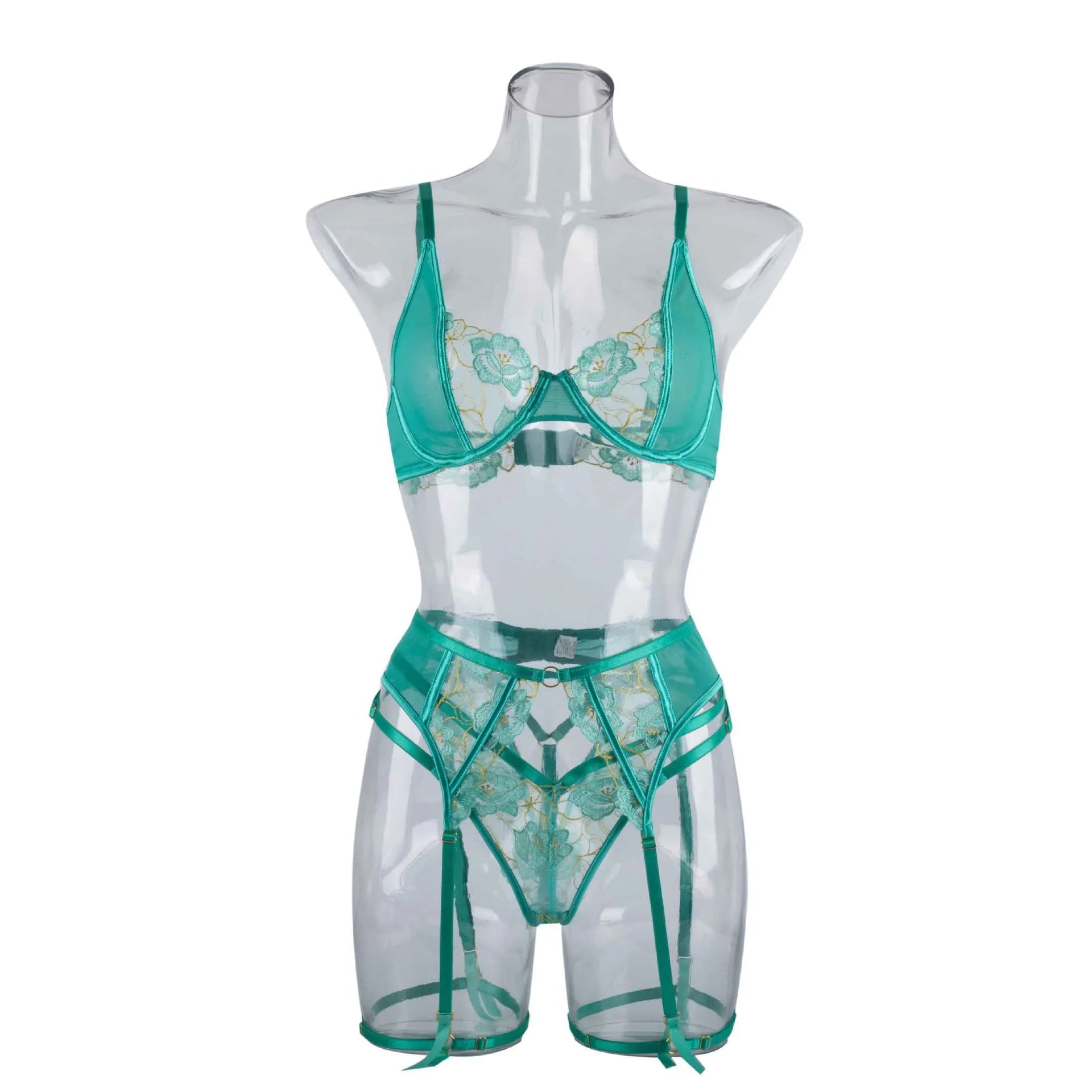 Light green women's embroidered bra and bikini set on a white background