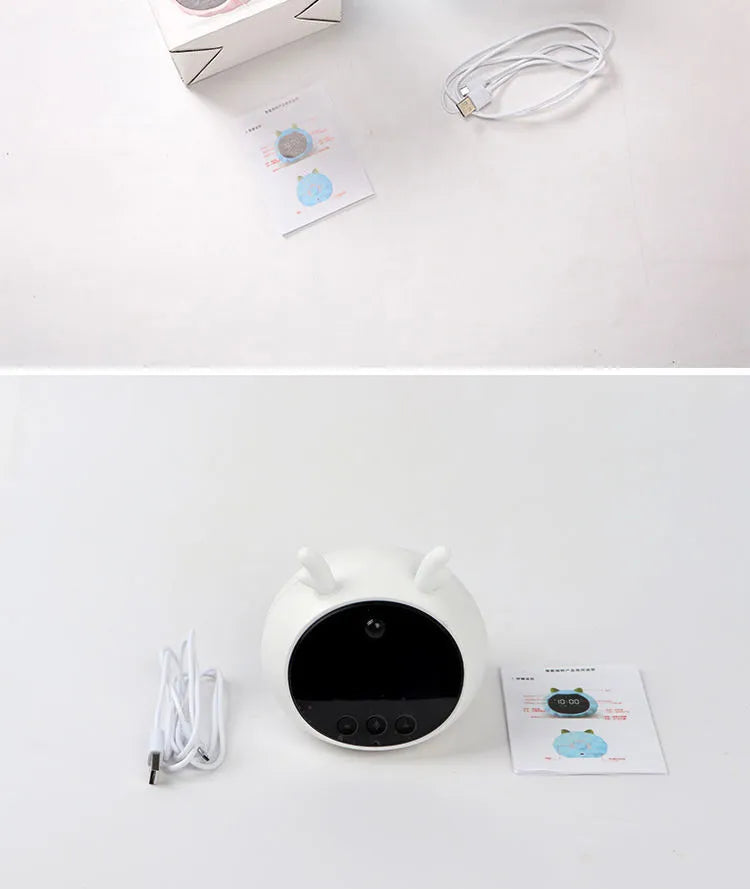 Smart alarm clock with voice control, human body sensor, and luminous dial in silicone white deer style.