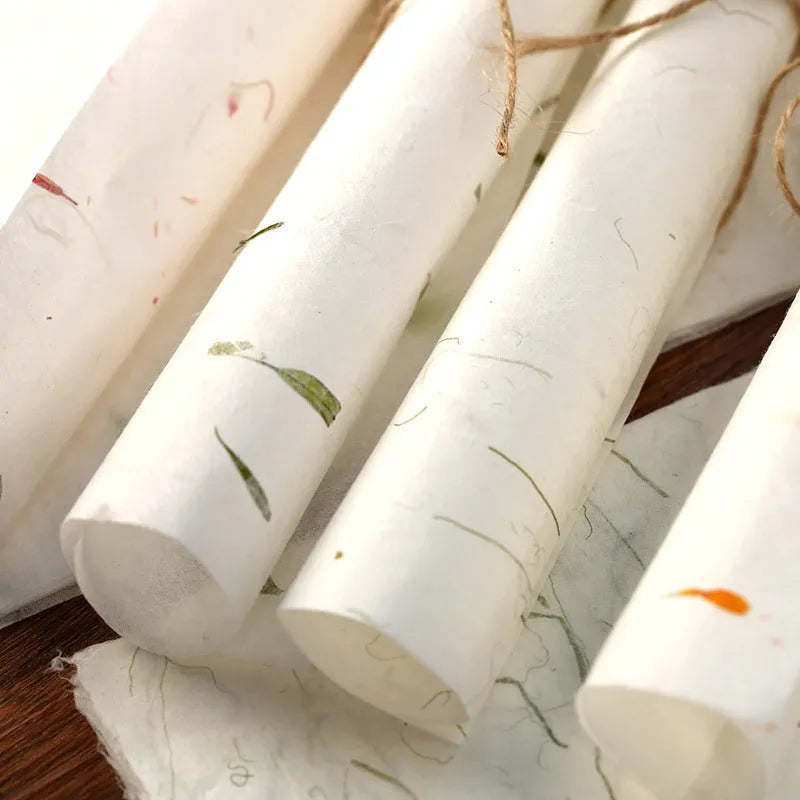 Ten sheets of Chinese-style painting paper in Green leaf design, each measuring 27.5 by 16.7 cm.