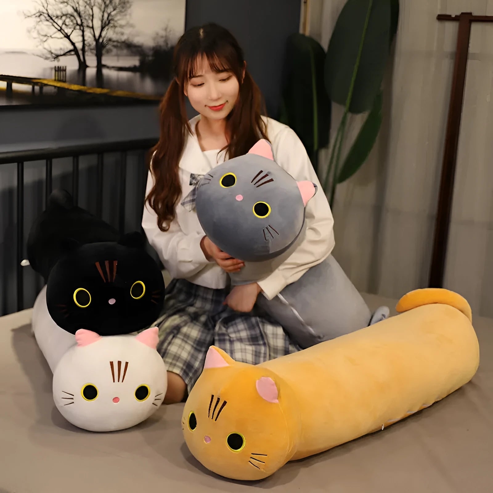 Large grey cartoon cat plush toy stuffed doll shown on a white background.